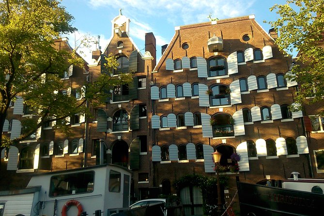 1,5 hours Amsterdam Rickshaw Tour - Rembrandtplein and the City’s Social Side
