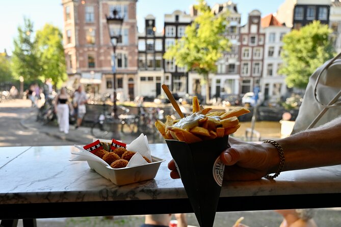 10 Tastes of Amsterdam: Food Tour by UNESCO Canals and Jordaan - Flower stalls and Dutch chocolate