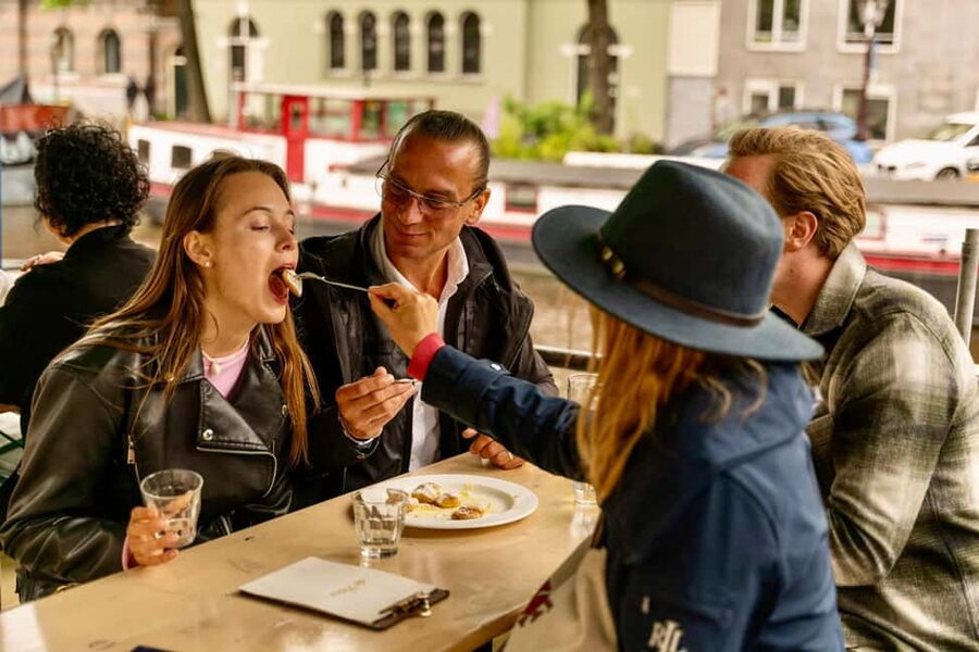 Amsterdam: 10 Tastings Guided Food Tour by UNESCO Canals - Walking through Jordaan with poffertjes