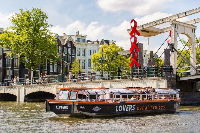 Amsterdam 1h Canal Cruise by Semi-Open Boat with Audio Guide - Merchant houses and the canal belt