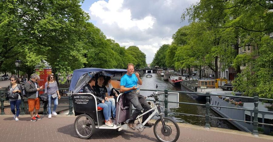 Amsterdam: 2-Hour Sightseeing Tour by Rickshaw - Canal houses and Amsterdam’s historic center