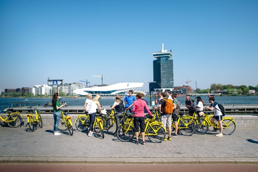 Amsterdam: 3h E-Bike Tour with break - Canals, harbor views, and Amsterdam’s quieter corners