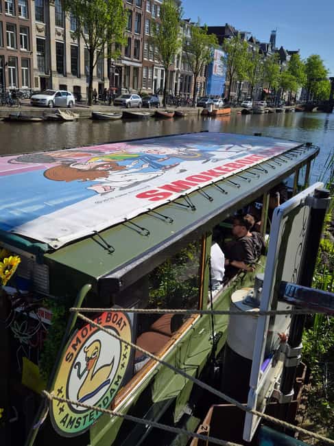Amsterdam: 420 Smoke-Friendly Boat Tour - Boarding near the red light district