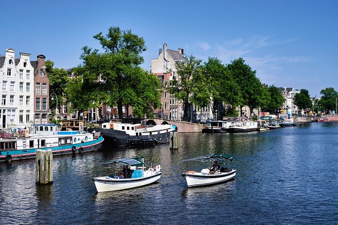 Amsterdam: 60-Minute Guided Private Canal Cruise with Drinks - The Golden Bend on Herengracht