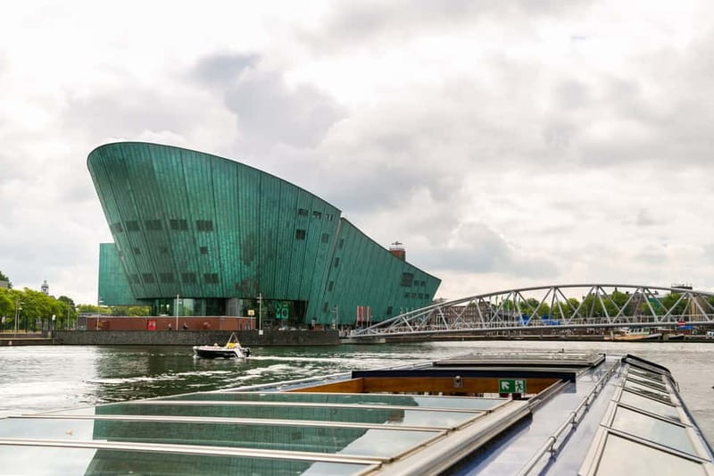Amsterdam: 75 Minute City Canal Cruise with Audio Guide - Inside, outside, and choosing your seat