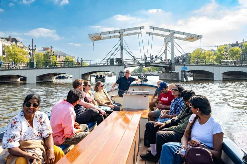 Amsterdam: 75 minute Open Boat Canal Cruise with Live Guide - Why a small open boat changes the experience