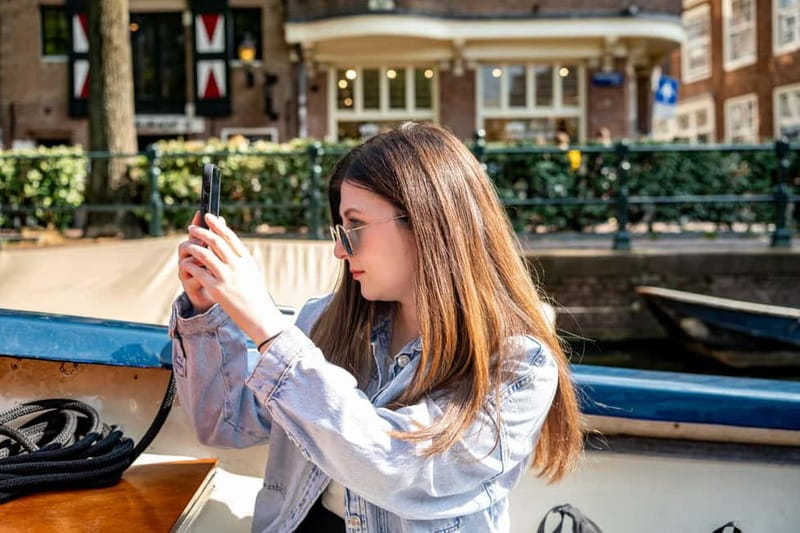 Amsterdam: 75 minute Open Boat Canal Cruise with Live Guide - Centraal Station, the IJ River, and northern views