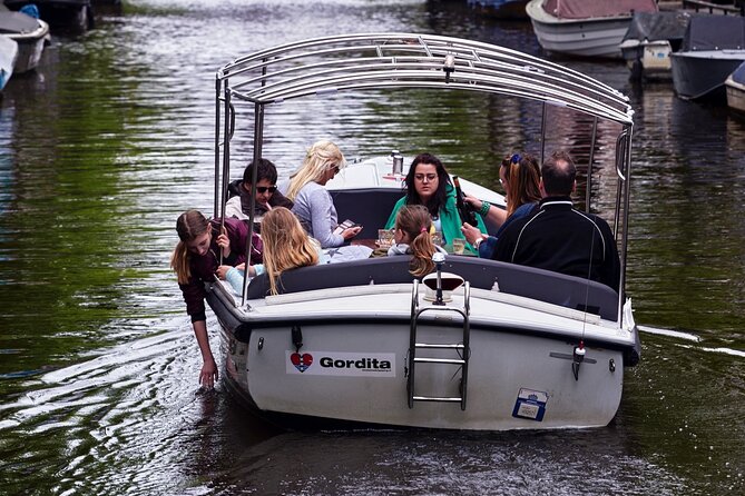 Amsterdam 90-min Private Canal Cruise with Live Guide and Drinks - Reaching the Amstel, where the city began