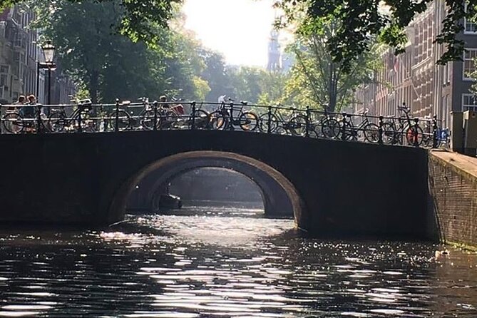 Amsterdam 90-min Private Canal Cruise with Live Guide and Drinks - The Dancing Houses and other playful details