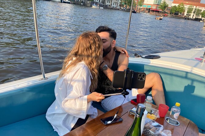 Amsterdam 90-min Private Canal Cruise with Live Guide and Drinks - Following the UNESCO canal belt through Amsterdam’s Golden Age