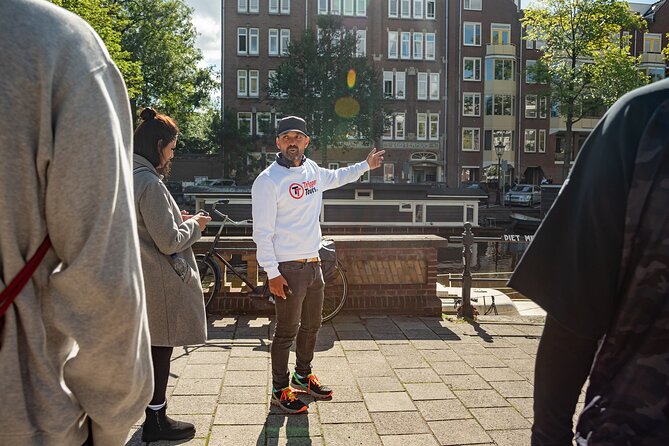 Amsterdam: Anne Frank and World War II Walking Tour (TOP RATED) - Dam Square, the Royal Palace, and changing city memory