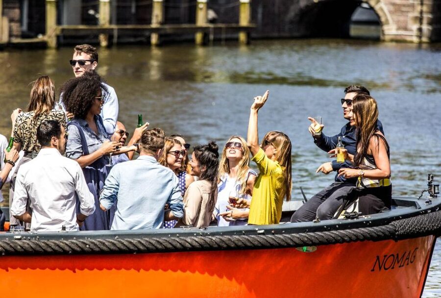Amsterdam: Canal Belt Private Beer Boat Tour - Four beers, soft cushions, and a private group