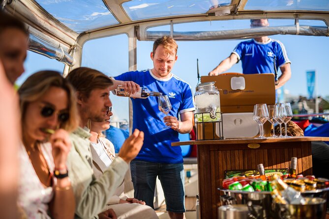 Amsterdam: Canal Booze Cruise with Unlimited Drinks Option - The Seven Bridges canal
