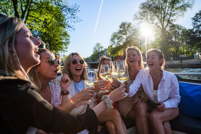 Amsterdam: Canal Booze Cruise with Unlimited Drinks Option - Cruising through De Wallen and central Amsterdam