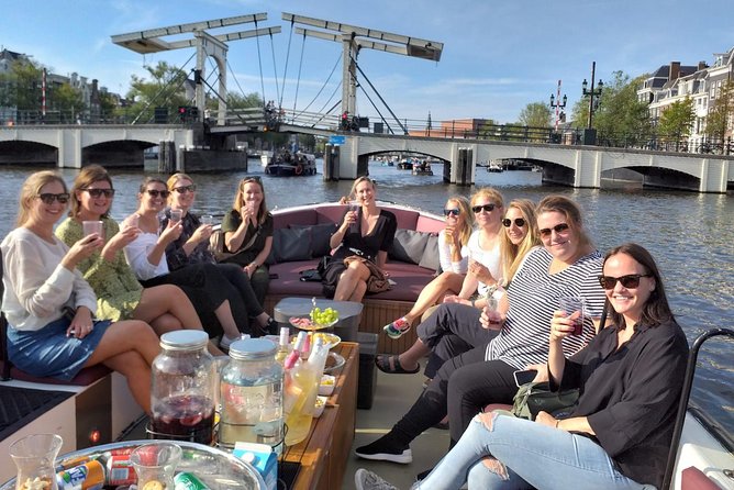 Amsterdam canal cruise in open boat – Guided tour - From Stationsplein to Amsterdam’s Canal Belt