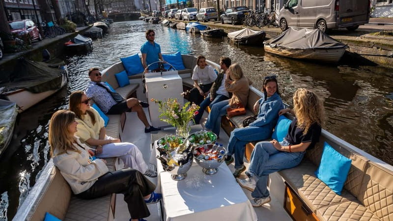 Amsterdam: Canal Cruise in Open Boat with Drink Option - Herengracht and the Dancing Houses