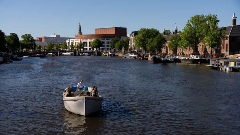 Amsterdam: Canal Cruise in Open Boat with Drink Option - The drink option and the $22 price