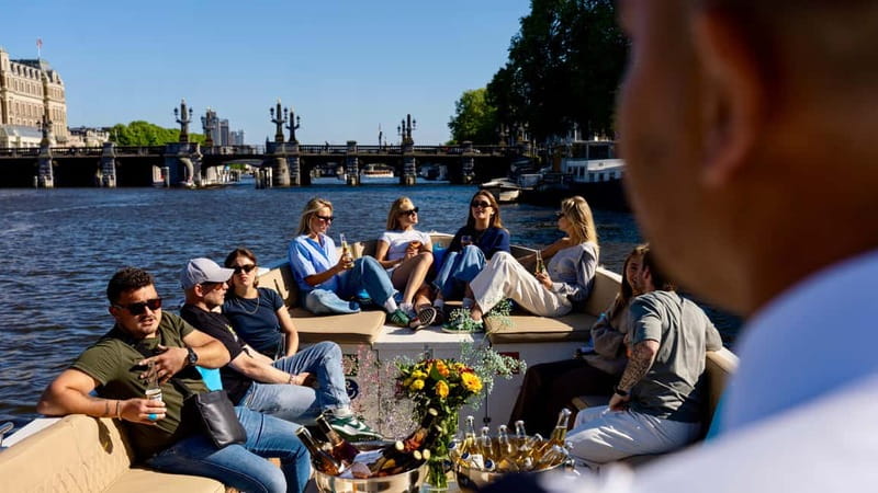 Amsterdam: Canal Cruise in Open Boat with Drink Option - Picking the right departure point