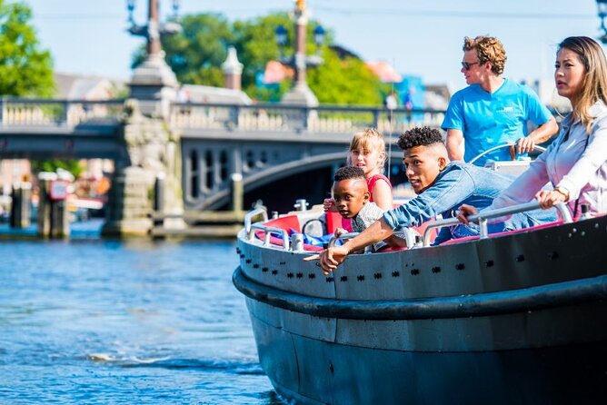 Amsterdam Canal Cruise in Open Boat with Unlimited Drinks Option - Captains make the difference