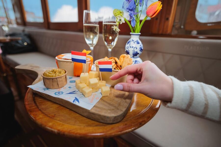 Amsterdam: Canal Cruise with Bubbles & Bites - Golden Bend, Maritime Museum, and Old Harbor views