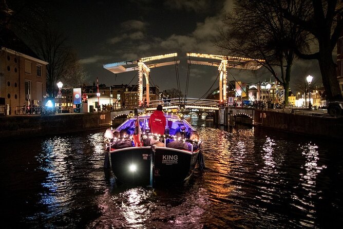 Amsterdam Canal Cruise With Live Guide and Unlimited Drinks - Rokin, the Mint Tower, and the southern canal ring