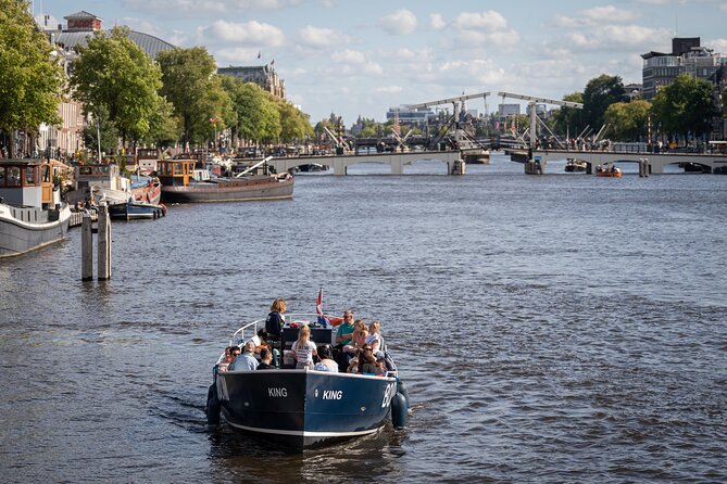 Amsterdam Canal Cruise with Live guide & Two drinks - Central St. - Two drinks, a restroom, and a relaxed boat ride