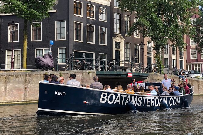Amsterdam Canal Cruise with Open Bar - Central Station - Leaving Central Station on an open electric boat