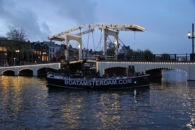 Amsterdam Canal Cruise with Open Bar - Central Station - Secret churches, old homes, and the Munt Tower