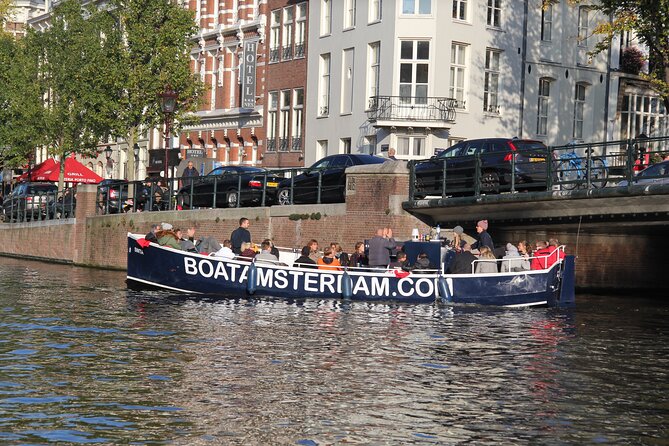 Amsterdam Canal Cruise with Open Bar - Central Station - Rembrandt, the Weeping Tower, and old maritime Amsterdam