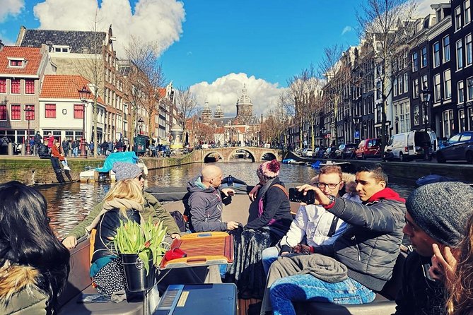 Amsterdam Canal Tour by Open Boat – 90 min Small Group Experience - De Wallen, old churches, and the House on the Three Canals
