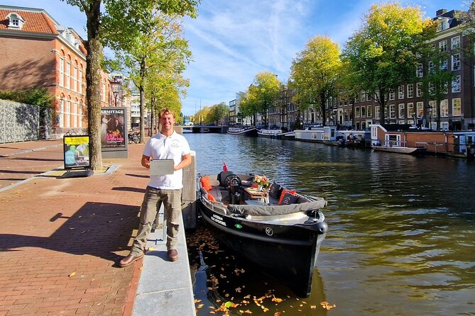 Amsterdam Canal Tour by Open Boat – 90 min Small Group Experience - Medieval locks and the eastern edge of the center