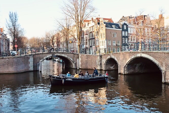 Amsterdam Canal Tour by Open Boat – 90 min Small Group Experience - Botanical Gardens and the canal belt