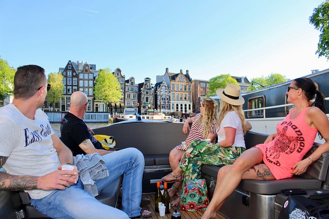 Amsterdam Canal Tour by Open Boat – 90 min Small Group Experience - Amstel River houses and the dancing buildings