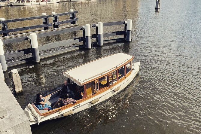 Amsterdam Champagne Private Canal Cruise - Booking timing, weather, and cancellation