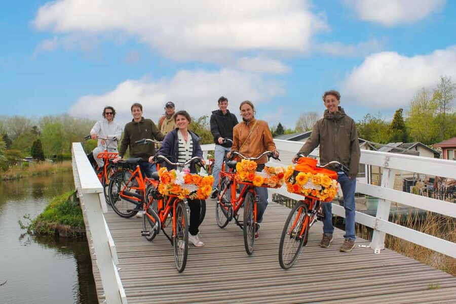 Amsterdam: Cheese, Windmill & Countryside Bike Tour - Leaving Central Amsterdam by Bicycle and Ferry