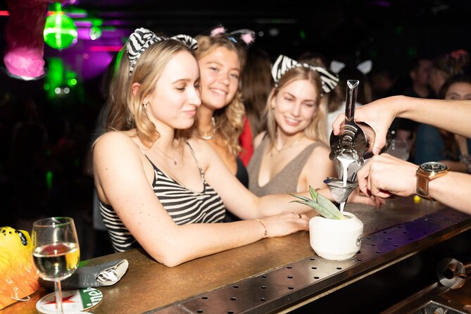 Amsterdam: City Centre Bar Crawl and Nightlife Experience - The first half-hour, shots, and social games