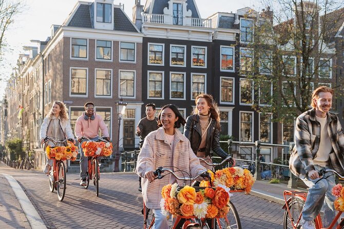 Amsterdam City Top Highlights Guided Bike Tour - Cafés, shops, and a glimpse of the oldest quarter
