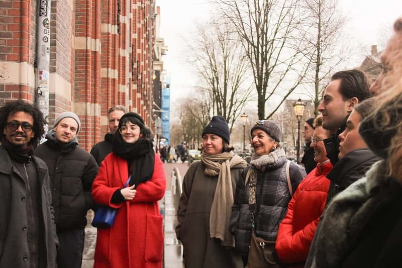 Amsterdam: City walking experience with a local - Starting at Beursplein near Bistro Berlage