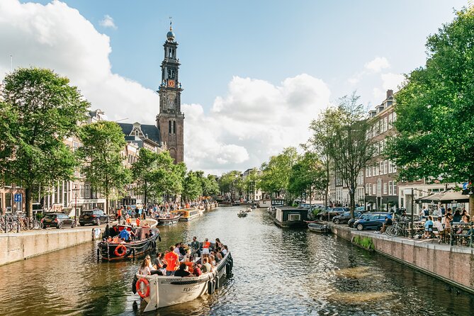Amsterdam Classic Saloon Boat Canal Cruise with Live Guide - Southern Church and Hendrick de Keyser
