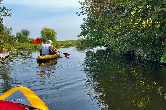 Amsterdam Countryside Bike and Kayak Tour - Cable ferries, drawbridges, and Dutch bike design