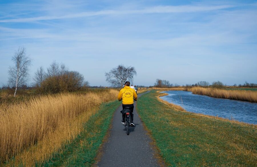 Amsterdam: Dutch Countryside E-Bike with Cheese & Clogs - Cheese, clogs, and a lively farm visit