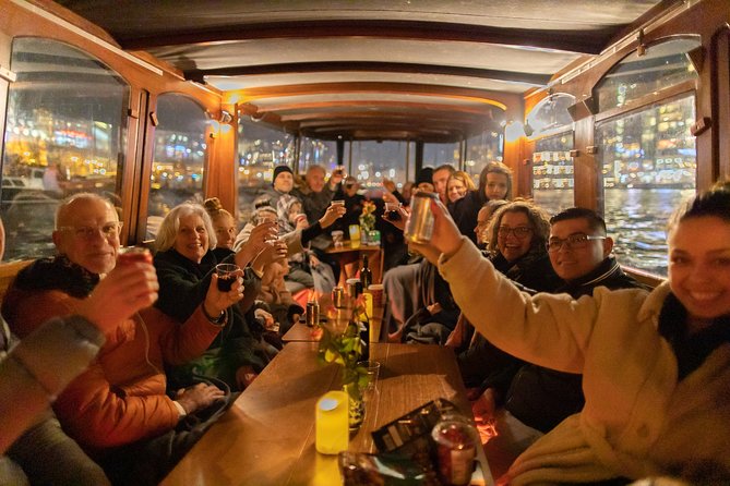 Amsterdam Evening Canal Cruise with Live Guide and Onboard Bar - Royal Theatre Carré and the Amstel