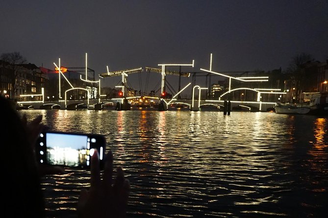 Amsterdam Festival of Lights Cruise by Captain Dave - What happens at Herengracht 124-128