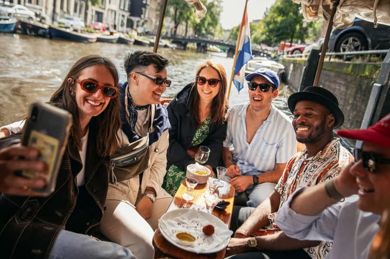 Amsterdam: Food and Canal Tour - Dutch cheese at a family-owned deli