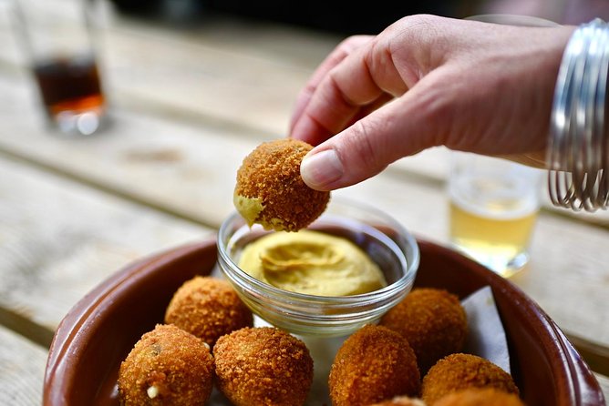 Amsterdam Food Tour of 10+ Local Classic Tastings in Jordaan Area - The secret dish keeps the ending lively