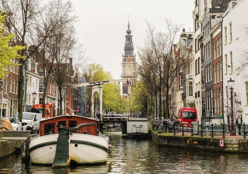 Amsterdam: German Canal Cruise with Unlimited Drinks Option - Muntplein and the final return through the center