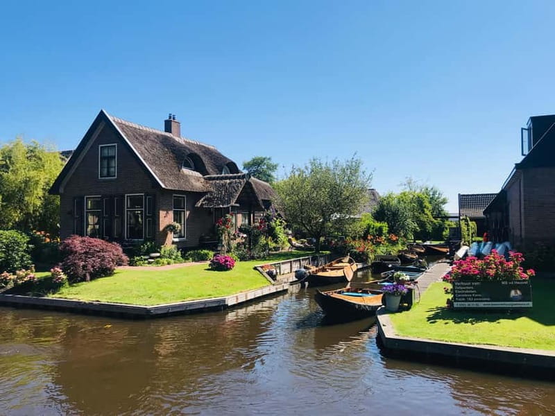 Amsterdam: Giethoorn, Afsluitdijk and Zaanse Schans Day Trip - Zaanse Schans: windmills, workshops, and a busy first stop