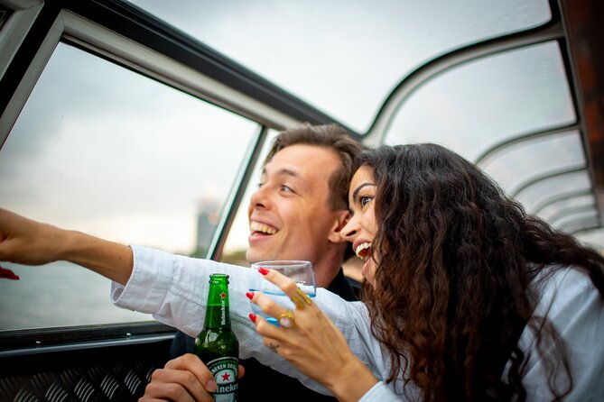 Amsterdam Guided Cruise with New York Pizza, Drinks and Ice Cream - Magere Brug and the Amstel River after dark
