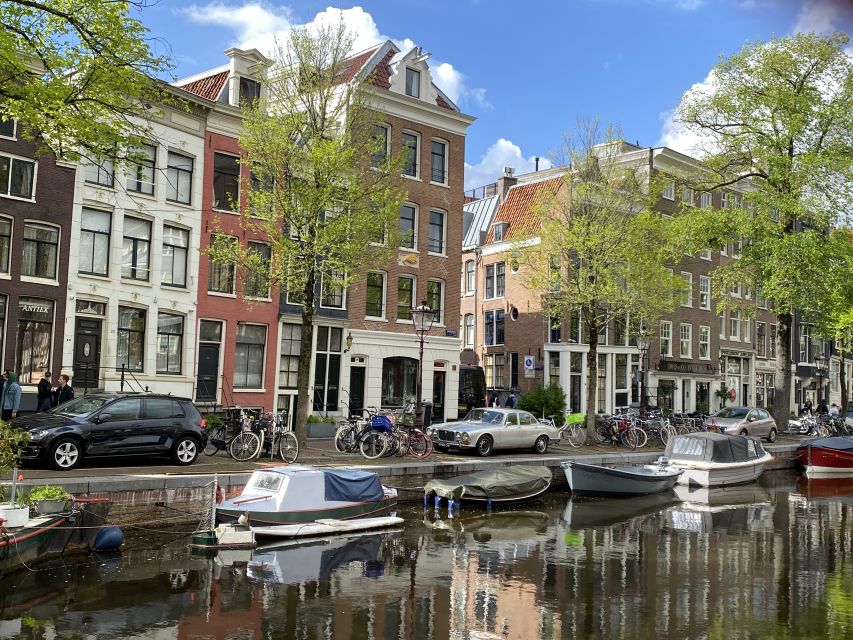 Amsterdam: Guided Off-The-Beaten-Track Walking Tour - Starting at Beursplein and Dam Square