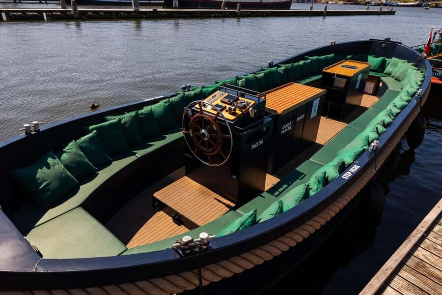 Amsterdam: Guided Open Boat Canal Cruise Including Drink - The Nine Streets and western canal belt